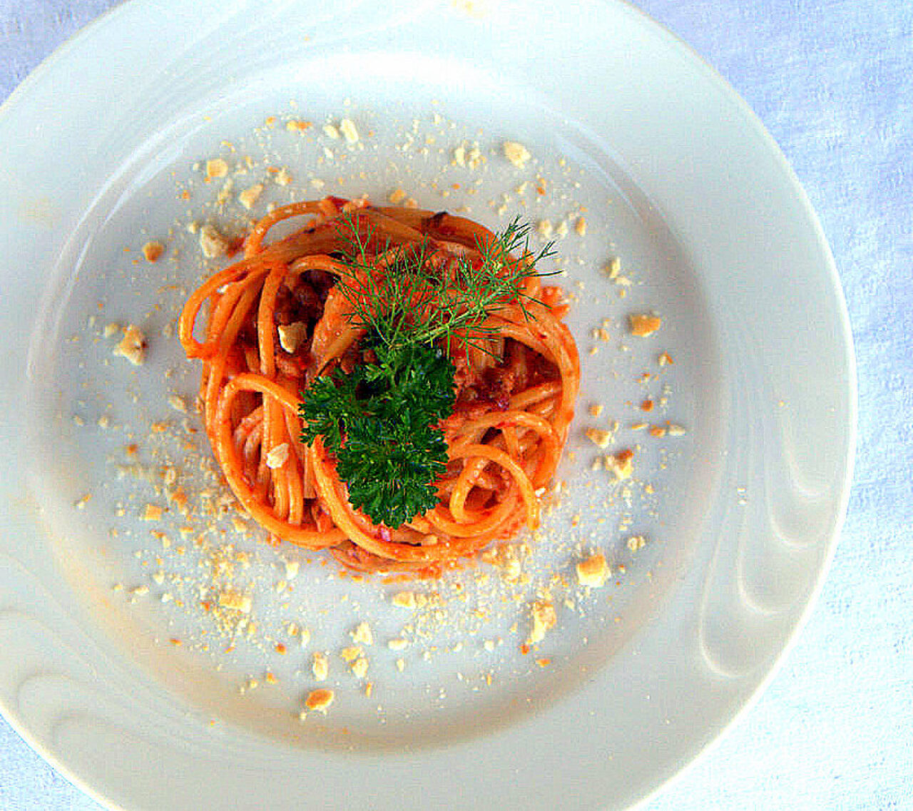 Chitarre con ragù bianco, 'nduja e briciole di tarallo