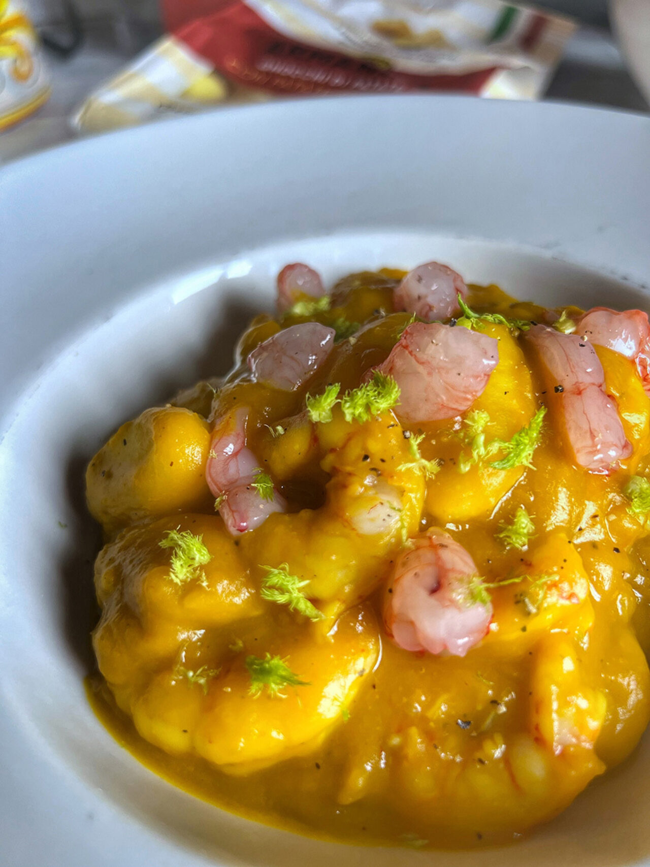 Gnocchi con crema di zucca e gamberi rossi