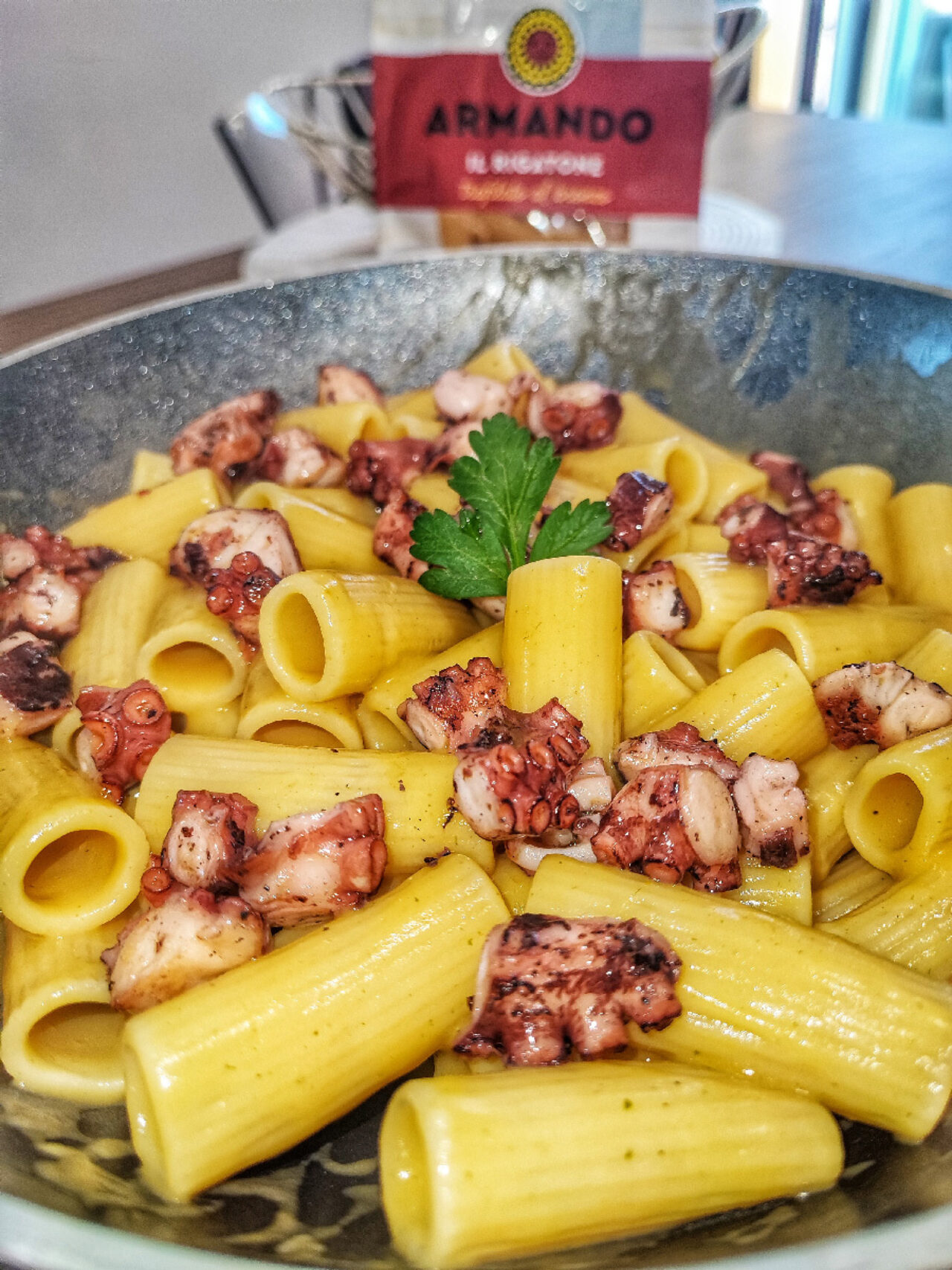 Rigatoni con crema di patate e polpo