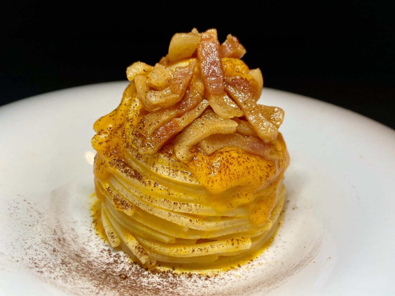 Chitarra Pasta Armando mit Kürbis, Speck und Kakao